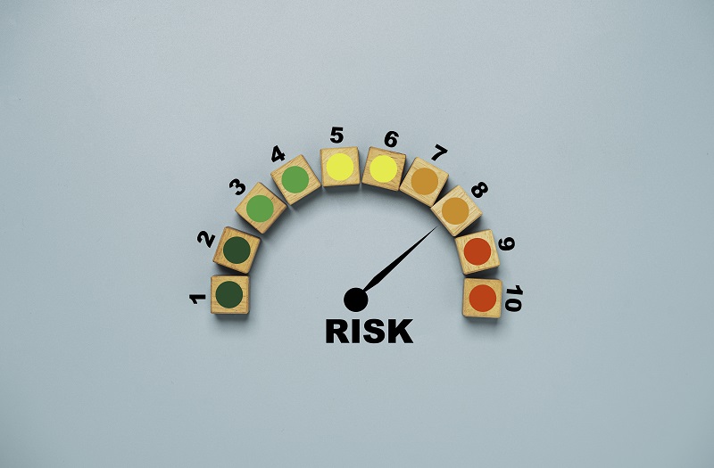 Risk level indicator rating print screen wooden cube block since low to high on blue background for Risk management and assessment concept.