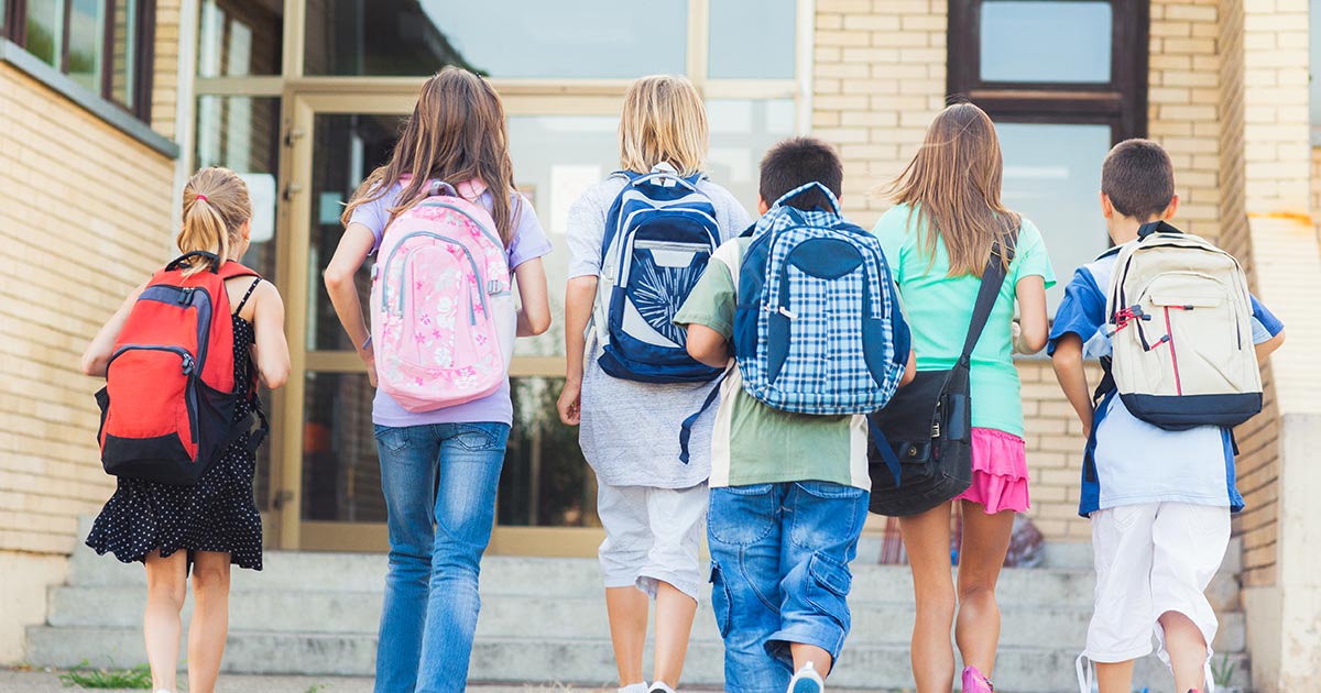 School children walking together.