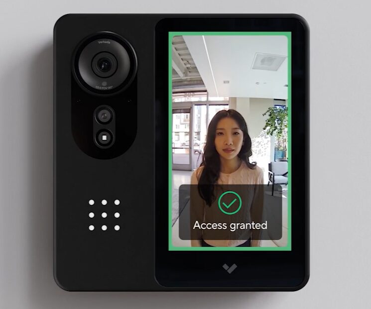 An access control panel showing an image of a woman with the words “Access Granted.”
